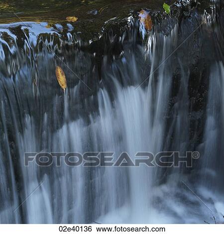 Stock Photograph - Waterfall in Stanley park in Vancouver, British Columbia, Canada. Fotosearch