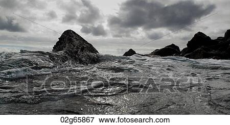 Waves breaking on the coast, Playa Ochoa, San Cristobal Island, Galapagos Islands, Ecuador View Large Photo Image Stock Photo - Waves breaking on the coast, Playa Ochoa, San Cristobal Island, Galapagos Islands, Ecuador. Fotosearch