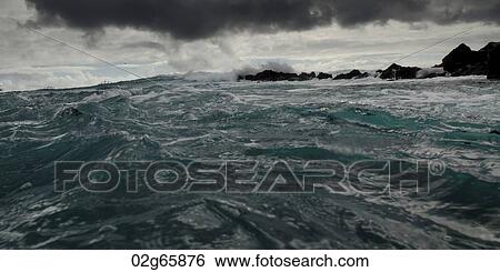 Waves breaking on the coast, Playa Ochoa, San Cristobal Island, Galapagos Islands, Ecuador View Large Photo Image Stock Photograph - Waves breaking on the coast, Playa Ochoa, San Cristobal Island, Galapagos Islands, Ecuador. Fotosearch