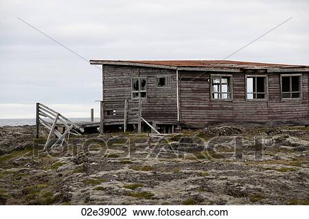 Stock Image - Weathered abandoned dwelling. Fotosearch