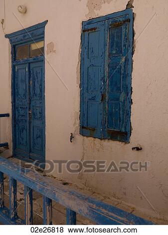 Weathered blue door in Mykonos Greece View Large Photo Image Stock Photo - Weathered blue door in Mykonos Greece. Fotosearch