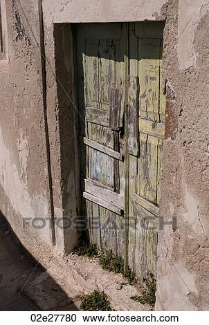 Weathered wooden doors in Santorini Greece View Large Photo Image Stock Image - Weathered wooden doors in Santorini Greece. Fotosearch