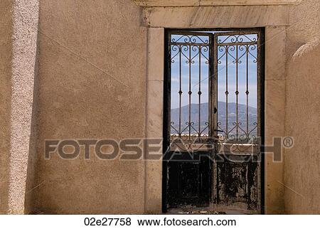 Weathered wooden doors in Santorini Greece View Large Photo Image Stock Photo - Weathered wooden doors in Santorini Greece. Fotosearch