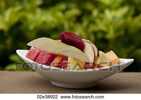 White bowl of sliced fresh fruit including melon, pineapple, strawberry, canteloup View Large Photo Image Stock Image - White bowl of sliced fresh fruit including melon, pineapple, strawberry, canteloup. Fotosearch