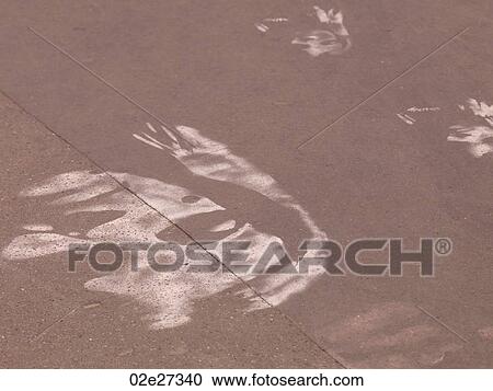 Stock Image - White marks on pavement in Paris France. Fotosearch