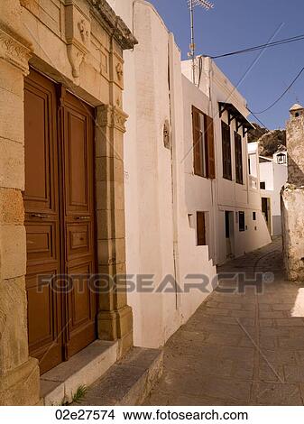 Wooden door and stone wall in Rhodes Greece View Large Photo Image Picture - Wooden door and stone wall in Rhodes Greece. Fotosearch