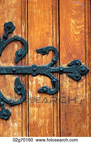 Wrought iron on a wooden door, Bergen, Norway View Large Photo Image Stock Image - Wrought iron on a wooden door, Bergen, Norway. Fotosearch