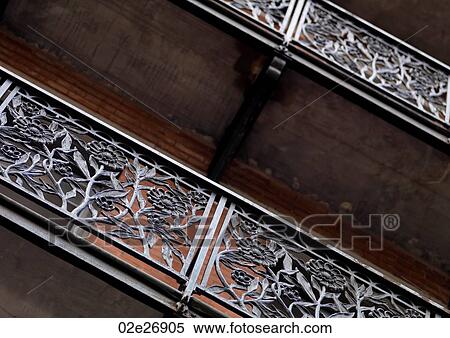 Stock Photography - Wrought Iron Railing in the Chelsea Hotel in Manhattan, New York City, U. S. A.. Fotosearch