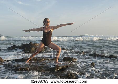 Yoga along Mal Pais coastline in San Jose Costa Rica View Large Photo Image Stock Image - Yoga along Mal Pais coastline in San Jose Costa Rica. Fotosearch