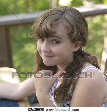 Young girl with inquiring look on her face at Lake of the Woods, Ontario View Large Photo Image Stock Photography - Young girl with inquiring look on her face at Lake of the Woods, Ontario. Fotosearch