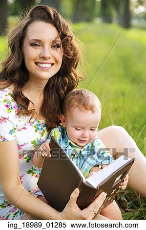 Stock Photography - Adorable mother with cute child. Fotosearch