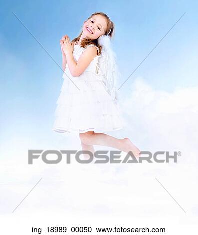 Stock Image - Angel kid girl with white wings. Fotosearch