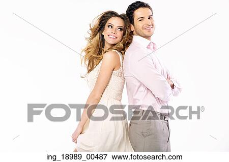 Attractive fresh woman looking at her handsome boyfriend View Large Photo Image Stock Photo - Attractive fresh woman looking at her handsome boyfriend. Fotosearch