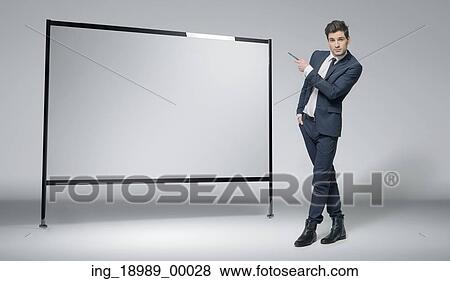 Attractive guy explain new strategy View Large Photo Image Stock Photo - Attractive guy explain new strategy. Fotosearch