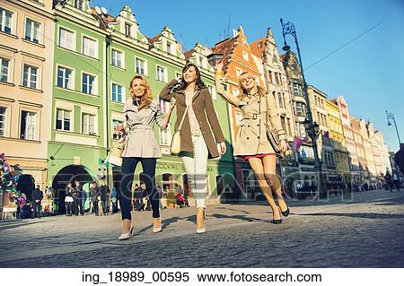 Attractive ladies in the crowdy downtown View Large Photo Image Stock Photography - Attractive ladies in the crowdy downtown. Fotosearch