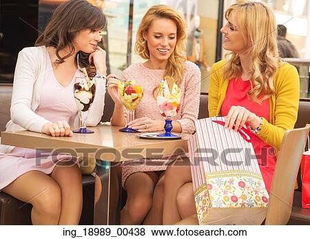 Attractive ladies in the luxury shopping mall View Large Photo Image Stock Photo - Attractive ladies in the luxury shopping mall. Fotosearch
