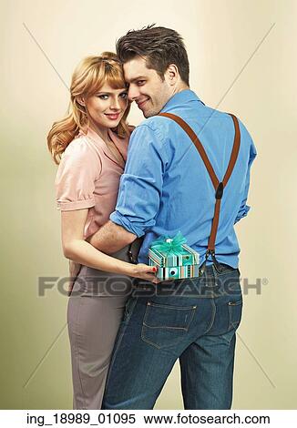 Attractive young couple with gifts for valentine’ s day View Large Photo Image Stock Photography - Attractive young couple with gifts for valentine’ s day. Fotosearch