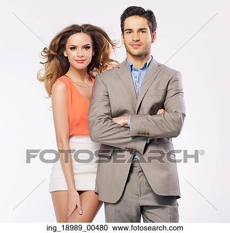 Stock Image - Attractive young woman with her handsome husband. Fotosearch