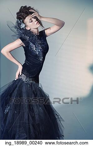 Beaitiful young lady in art pose View Large Photo Image Stock Image - Beaitiful young lady in art pose. Fotosearch