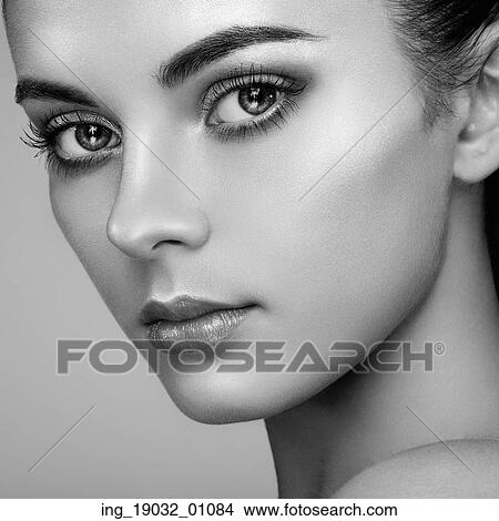 Picture - Beautiful woman face. Perfect makeup. Beauty fashion. Eyelashes. Cosmetic Eyeshadow. Highlighting. Black and white. Fotosearch