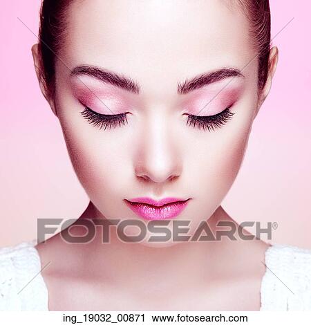 Stock Image - Beautiful woman face. Perfect makeup. Beauty fashion. Eyelashes. Cosmetic Eyeshadow. Fotosearch