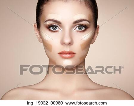 Stock Image - Beautiful woman face. Perfect makeup. Beauty fashion. Eyelashes. Cosmetic Eyeshadow. Fotosearch