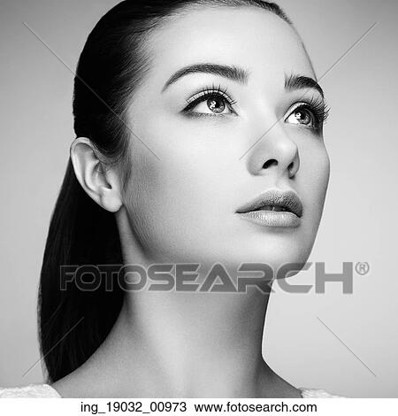 Stock Image - Beautiful woman face. Perfect makeup. Beauty fashion. Eyelashes. Cosmetic Eyeshadow. Fotosearch