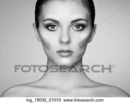 Stock Photography - Beautiful woman face. Perfect makeup. Beauty fashion. Eyelashes. Cosmetic Eyeshadow. Black and white. Fotosearch