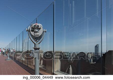 Stock Photo - Binoculars at Top of the Rock observation deck, Midtown Manhattan, New York City, New York State, USA. Fotosearch