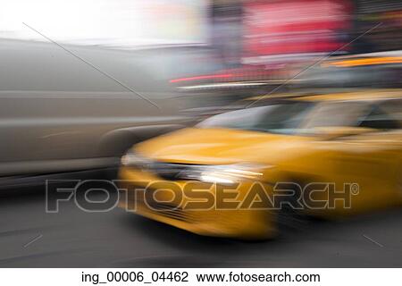 Blurred view of Yellow taxi moving in Times Square, Manhattan, New York City, New York State, USA View Large Photo Image Stock Image - Blurred view of Yellow taxi moving in Times Square, Manhattan, New York City, New York State, USA. Fotosearch