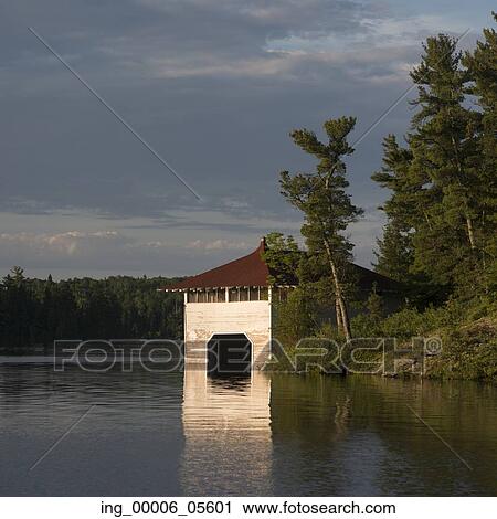 Boathouse at lakeside, Lake Of The Woods, Ontario, Canada View Large Photo Image Stock Image - Boathouse at lakeside, Lake Of The Woods, Ontario, Canada. Fotosearch