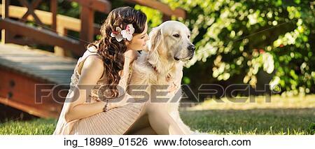 Cheerful woman with her lovely pet View Large Photo Image Stock Photograph - Cheerful woman with her lovely pet. Fotosearch