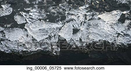 Stock Photography - Chunks of ice, Lake of the Woods, Ontario, Canada. Fotosearch