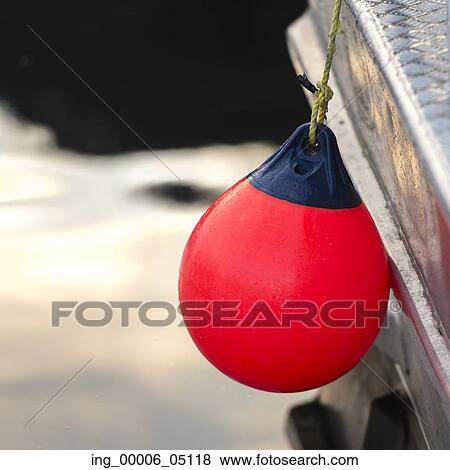 Stock Photo - Close-up of hanging commercial fishing buoy, Skeena-Queen Charlotte Regional District, Haida Gwaii, Graham Island, British Columbia, Canada. Fotosearch