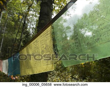 Stock Photo - Close-up of prayer flags, Lake Of The Woods, Ontario, Canada. Fotosearch