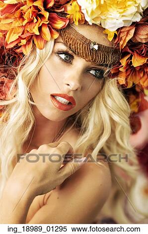 Stock Photography - Closeup portrait of the lady with excelent flower wreath. Fotosearch