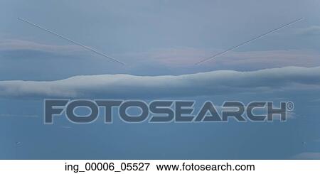 Stock Photo - Clouds in the sky, Patagonia, Chile. Fotosearch