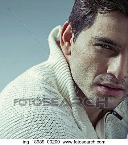 Stock Image - Colorful picture of young handsome guy. Fotosearch