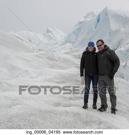 Stock Photography - Couple on Perito Moreno Glacier, Los Glaciares National Park, Santa Cruz Province, Patagonia, Argentina. Fotosearch