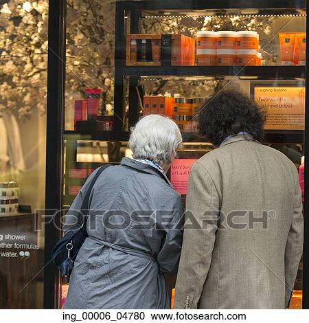 Couple window shopping, SoHo, Manhattan, New York City, New York State, USA View Large Photo Image Stock Image - Couple window shopping, SoHo, Manhattan, New York City, New York State, USA. Fotosearch