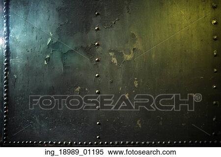 Stock Photography - Crushed metal wal in the abandoned warehouse. Fotosearch