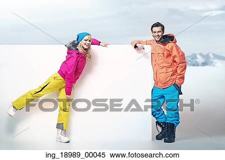 Stock Photography - Cute blonde lady with her attractive boyfriend. Fotosearch