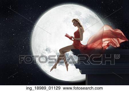Stock Photo - Cute lady over full moon background. Fotosearch