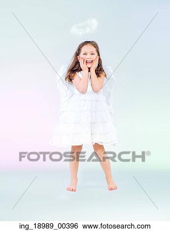 Stock Photograph - Cute little girl as an pretty angel. Fotosearch