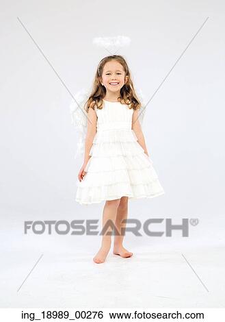 Stock Photograph - Cute little girl as an pure white angel. Fotosearch