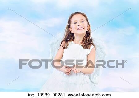 Stock Image - Cute little princess with pretty wide smile. Fotosearch