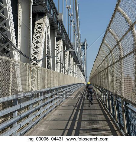 Cyclist on Manhattan Bridge, Brooklyn, Manhattan, New York City, New York State, USA View Large Photo Image Stock Image - Cyclist on Manhattan Bridge, Brooklyn, Manhattan, New York City, New York State, USA. Fotosearch