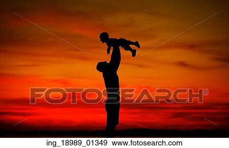Stock Photo - Dad tossing his lovely baby. Fotosearch