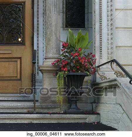 Stock Image - Decorative urn outside a building, Golden Square Mile, Montreal, Quebec, Canada. Fotosearch