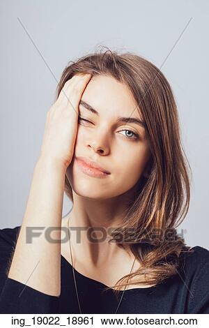 depressed girl on a gray background View Large Photo Image Stock Image - depressed girl on a gray background. Fotosearch